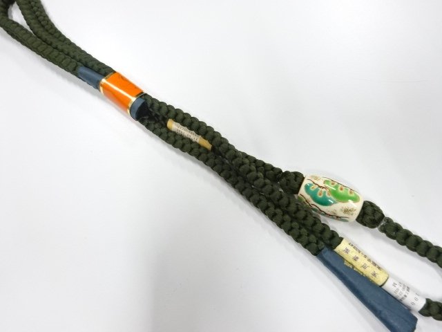  未使用品　金彩色絵磁器帯留め・正絹手組帯締めセット